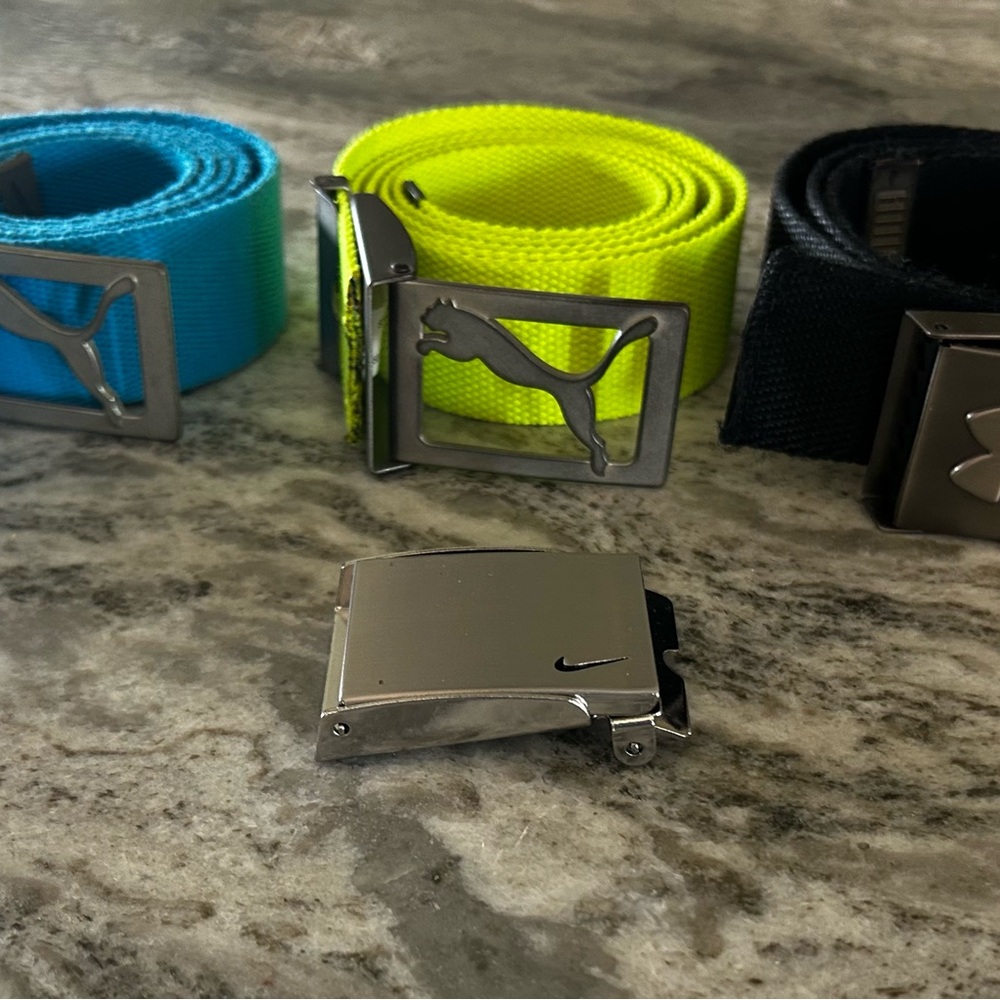 2 Puma and 1 UA Golf belt with Nike buck Belts in Blue, Yellow, and Black
